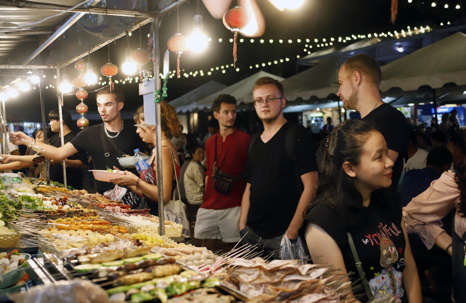 Begin your shopping adventure with Laos’ golden glow